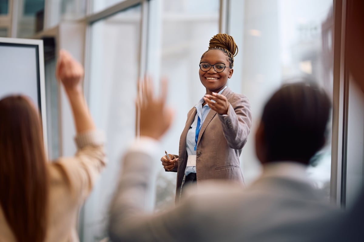 Businesswoman leading a discussion during a boardroom conference