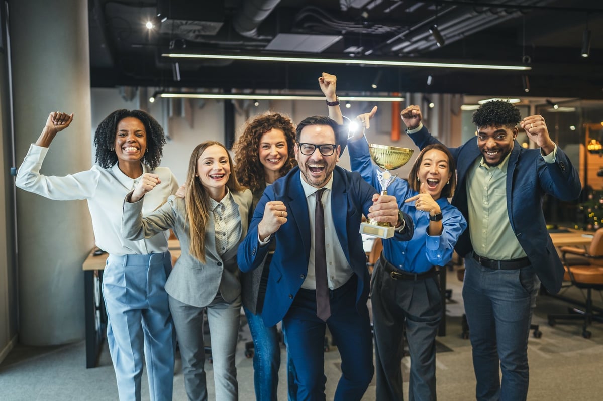 Diverse group of happy business people celebrating a shared success